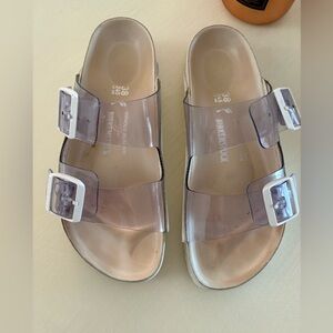 Birkenstock Manolo Blahnik Transparent Strap Sandals & White Buckles.